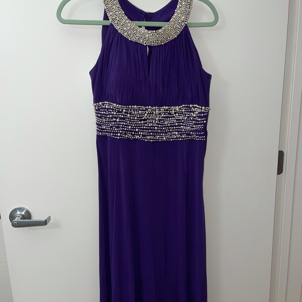 Long purple dress embellished